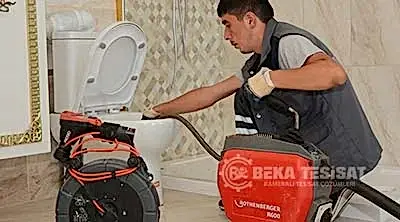 robotla cihazla tuvalet acma